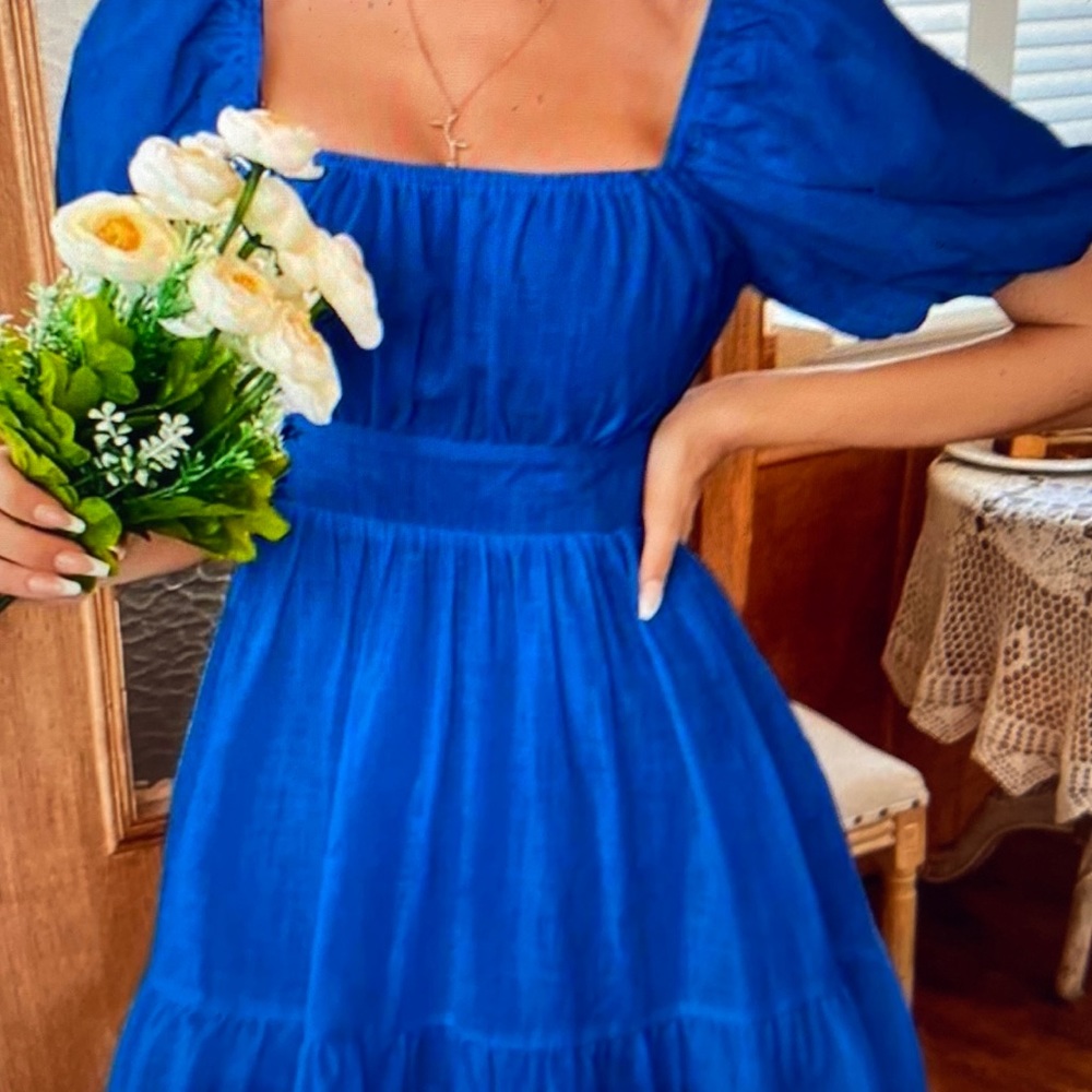 COPY - Navy blue tie back linen dress with cut out. Puffy sleeves and above the…